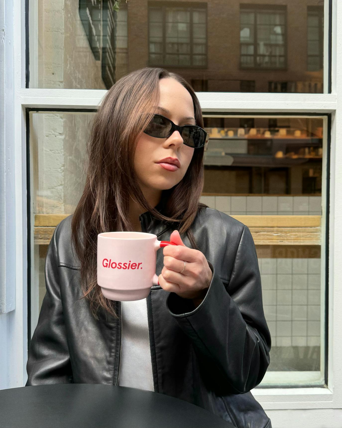 Brigitte with our Three Eyed Smiley Mug